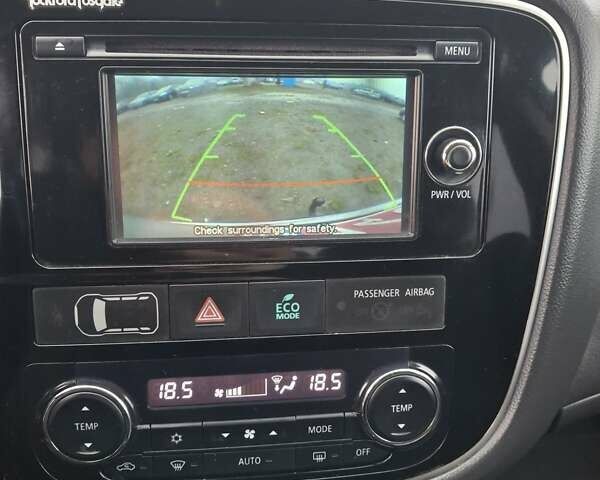 Серый Мицубиси Аутлендер, объемом двигателя 2.3 л и пробегом 205 тыс. км за 15999 $, фото 4 на Automoto.ua