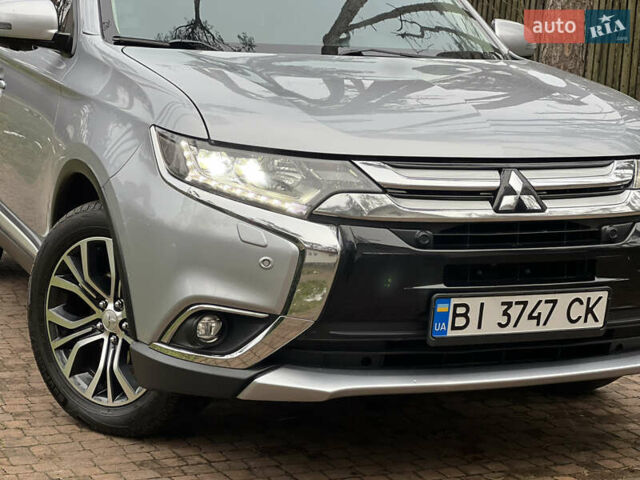 Серый Мицубиси Аутлендер, объемом двигателя 2.4 л и пробегом 189 тыс. км за 16950 $, фото 5 на Automoto.ua