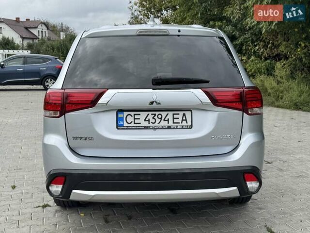 Сірий Міцубісі Аутлендер, об'ємом двигуна 2.36 л та пробігом 153 тис. км за 12500 $, фото 7 на Automoto.ua