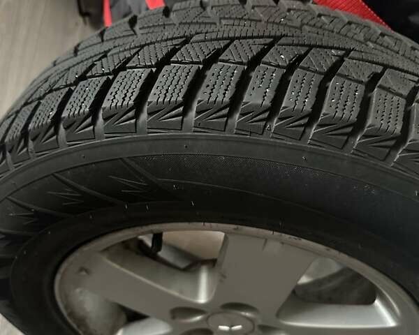 Серый Мицубиси Аутлендер, объемом двигателя 2.36 л и пробегом 85 тыс. км за 17500 $, фото 32 на Automoto.ua