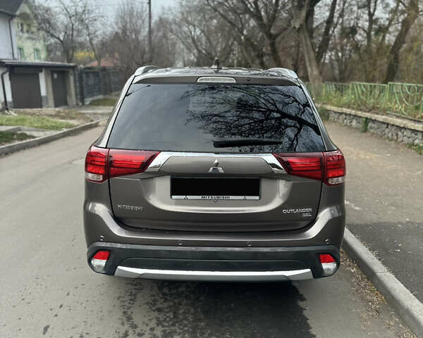 Сірий Міцубісі Аутлендер, об'ємом двигуна 2.36 л та пробігом 48 тис. км за 18000 $, фото 4 на Automoto.ua