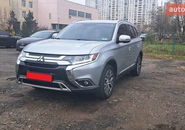 Серый Мицубиси Аутлендер, объемом двигателя 2.36 л и пробегом 120 тыс. км за 16100 $, фото 31 на Automoto.ua