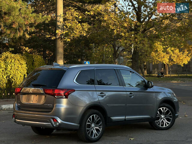Серый Мицубиси Аутлендер, объемом двигателя 2.4 л и пробегом 167 тыс. км за 15999 $, фото 6 на Automoto.ua