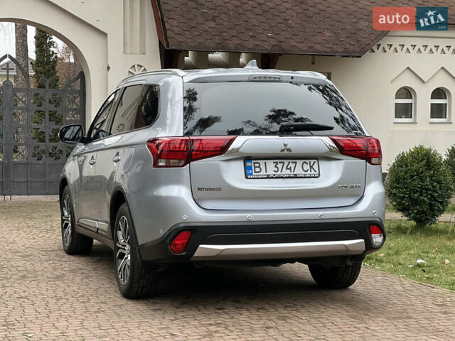 Серый Мицубиси Аутлендер, объемом двигателя 2.4 л и пробегом 189 тыс. км за 16950 $, фото 12 на Automoto.ua