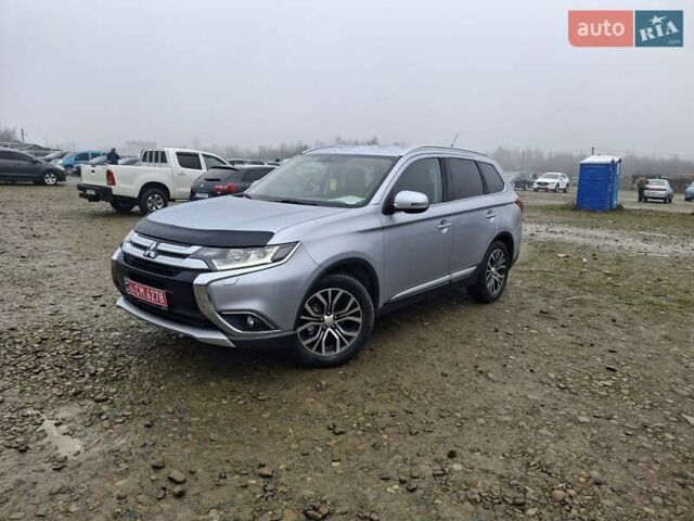 Серый Мицубиси Аутлендер, объемом двигателя 2.3 л и пробегом 205 тыс. км за 15999 $, фото 2 на Automoto.ua