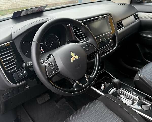 Сірий Міцубісі Аутлендер, об'ємом двигуна 2.36 л та пробігом 86 тис. км за 17000 $, фото 31 на Automoto.ua