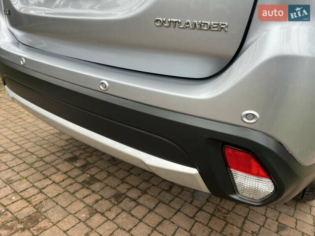 Серый Мицубиси Аутлендер, объемом двигателя 2.4 л и пробегом 189 тыс. км за 16950 $, фото 136 на Automoto.ua