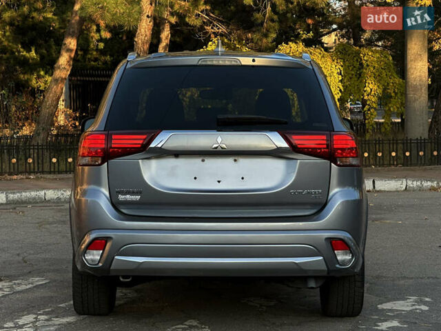 Серый Мицубиси Аутлендер, объемом двигателя 2.4 л и пробегом 167 тыс. км за 15999 $, фото 5 на Automoto.ua
