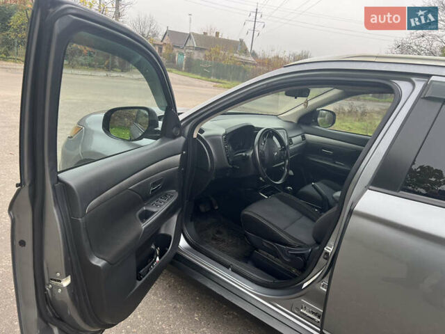 Серый Мицубиси Аутлендер, объемом двигателя 2.36 л и пробегом 85 тыс. км за 15500 $, фото 11 на Automoto.ua