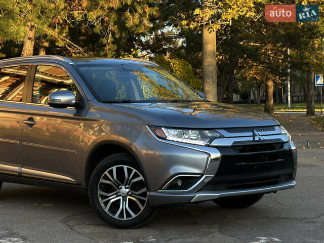Серый Мицубиси Аутлендер, объемом двигателя 2.4 л и пробегом 167 тыс. км за 15999 $, фото 9 на Automoto.ua