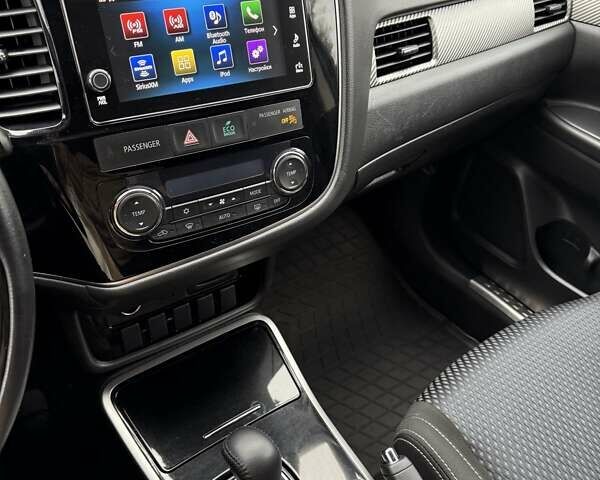 Сірий Міцубісі Аутлендер, об'ємом двигуна 2.36 л та пробігом 86 тис. км за 17000 $, фото 23 на Automoto.ua