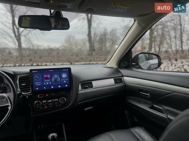 Серый Мицубиси Аутлендер, объемом двигателя 2.2 л и пробегом 152 тыс. км за 17800 $, фото 74 на Automoto.ua