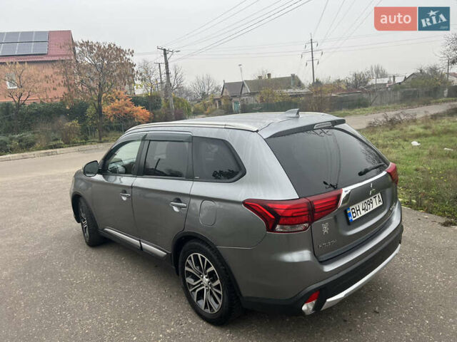 Серый Мицубиси Аутлендер, объемом двигателя 2.36 л и пробегом 85 тыс. км за 15500 $, фото 4 на Automoto.ua