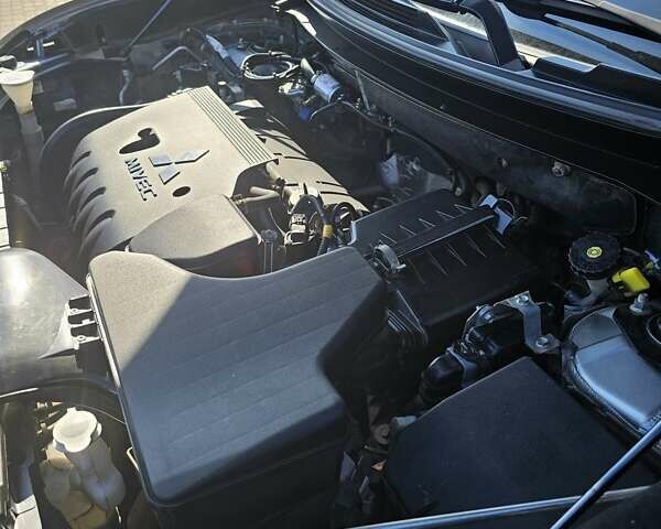 Сірий Міцубісі Аутлендер, об'ємом двигуна 2.36 л та пробігом 153 тис. км за 18000 $, фото 29 на Automoto.ua