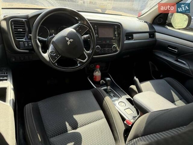 Сірий Міцубісі Аутлендер, об'ємом двигуна 2.36 л та пробігом 162 тис. км за 12300 $, фото 10 на Automoto.ua
