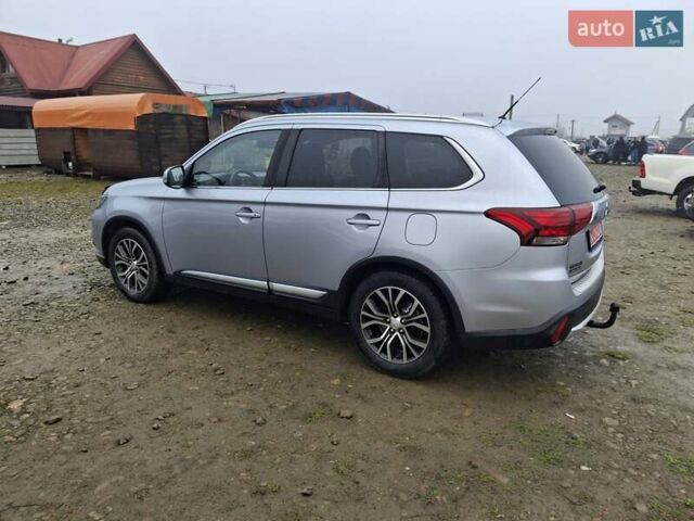Серый Мицубиси Аутлендер, объемом двигателя 2.3 л и пробегом 205 тыс. км за 15999 $, фото 5 на Automoto.ua