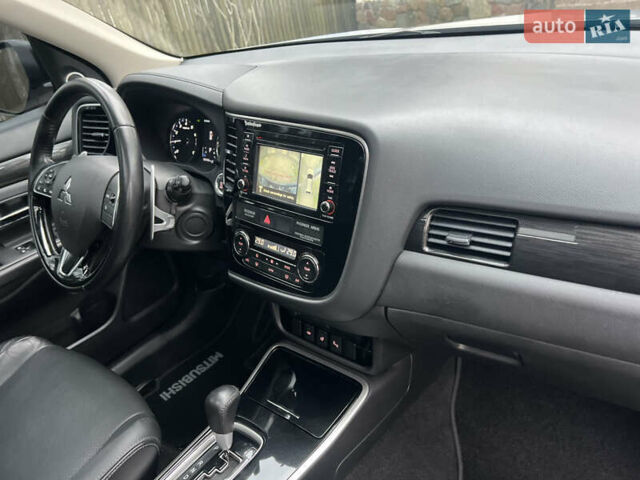 Серый Мицубиси Аутлендер, объемом двигателя 2.4 л и пробегом 189 тыс. км за 16950 $, фото 115 на Automoto.ua