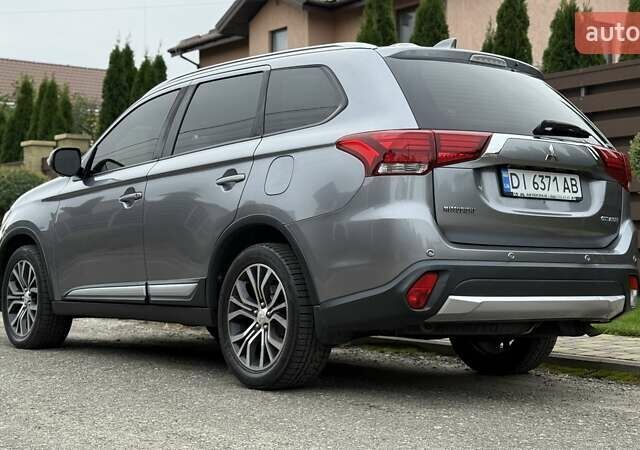 Серый Мицубиси Аутлендер, объемом двигателя 2.36 л и пробегом 153 тыс. км за 16950 $, фото 3 на Automoto.ua