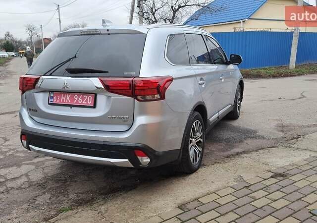 Серый Мицубиси Аутлендер, объемом двигателя 2.36 л и пробегом 120 тыс. км за 16100 $, фото 6 на Automoto.ua