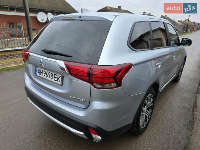Серый Мицубиси Аутлендер, объемом двигателя 2.36 л и пробегом 170 тыс. км за 13800 $, фото 10 на Automoto.ua