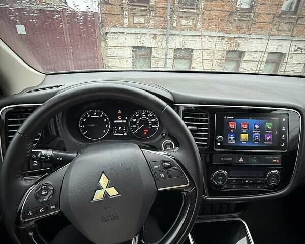 Сірий Міцубісі Аутлендер, об'ємом двигуна 2.36 л та пробігом 86 тис. км за 17000 $, фото 15 на Automoto.ua