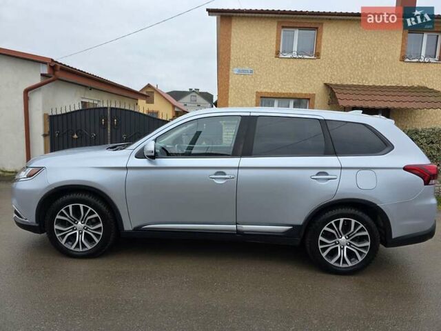 Серый Мицубиси Аутлендер, объемом двигателя 2.36 л и пробегом 170 тыс. км за 13800 $, фото 4 на Automoto.ua