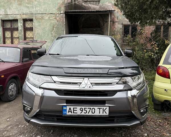 Сірий Міцубісі Аутлендер, об'ємом двигуна 2.36 л та пробігом 162 тис. км за 12300 $, фото 5 на Automoto.ua