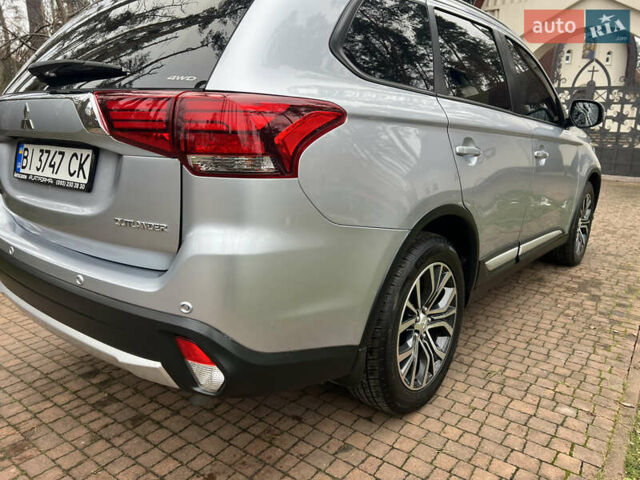 Серый Мицубиси Аутлендер, объемом двигателя 2.4 л и пробегом 189 тыс. км за 16950 $, фото 25 на Automoto.ua