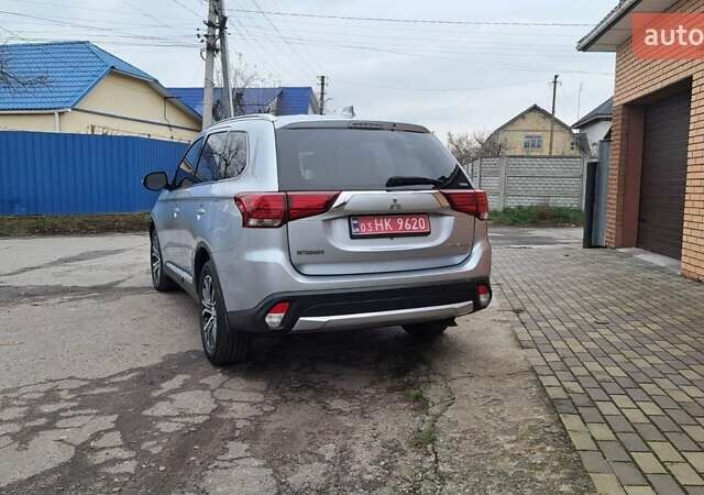 Серый Мицубиси Аутлендер, объемом двигателя 2.36 л и пробегом 120 тыс. км за 16100 $, фото 7 на Automoto.ua
