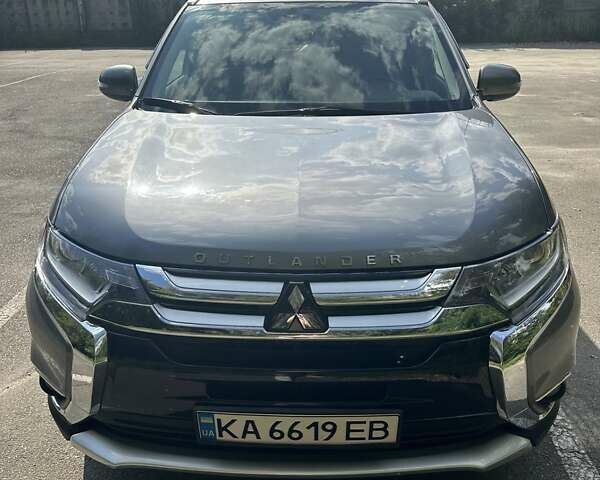 Серый Мицубиси Аутлендер, объемом двигателя 2.36 л и пробегом 85 тыс. км за 17500 $, фото 2 на Automoto.ua