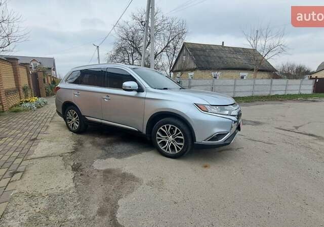 Серый Мицубиси Аутлендер, объемом двигателя 2.36 л и пробегом 120 тыс. км за 16100 $, фото 4 на Automoto.ua