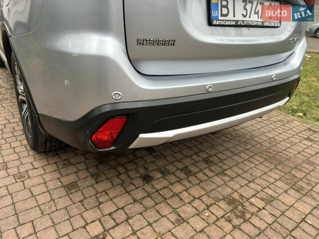 Серый Мицубиси Аутлендер, объемом двигателя 2.4 л и пробегом 189 тыс. км за 16950 $, фото 132 на Automoto.ua