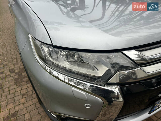 Серый Мицубиси Аутлендер, объемом двигателя 2.4 л и пробегом 189 тыс. км за 16950 $, фото 124 на Automoto.ua