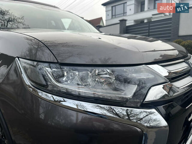 Сірий Міцубісі Аутлендер, об'ємом двигуна 2.36 л та пробігом 48 тис. км за 18000 $, фото 2 на Automoto.ua