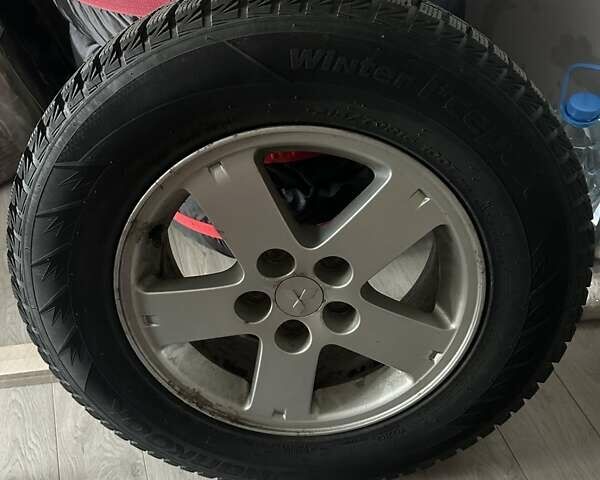 Серый Мицубиси Аутлендер, объемом двигателя 2.36 л и пробегом 85 тыс. км за 17500 $, фото 31 на Automoto.ua