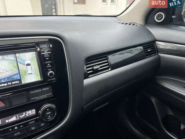 Серый Мицубиси Аутлендер, объемом двигателя 2.4 л и пробегом 189 тыс. км за 16950 $, фото 70 на Automoto.ua