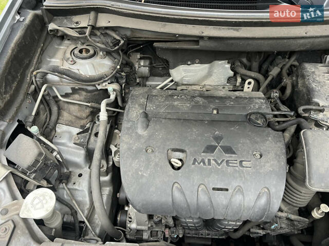 Серый Мицубиси Аутлендер, объемом двигателя 2.4 л и пробегом 189 тыс. км за 16950 $, фото 38 на Automoto.ua