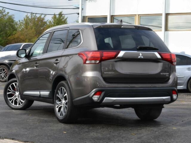 Сірий Міцубісі Аутлендер, об'ємом двигуна 2.4 л та пробігом 50 тис. км за 7000 $, фото 4 на Automoto.ua