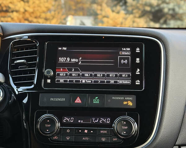 Серый Мицубиси Аутлендер, объемом двигателя 2 л и пробегом 107 тыс. км за 20900 $, фото 27 на Automoto.ua