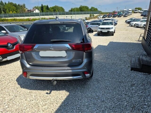 Серый Мицубиси Аутлендер, объемом двигателя 2.4 л и пробегом 89 тыс. км за 9900 $, фото 4 на Automoto.ua