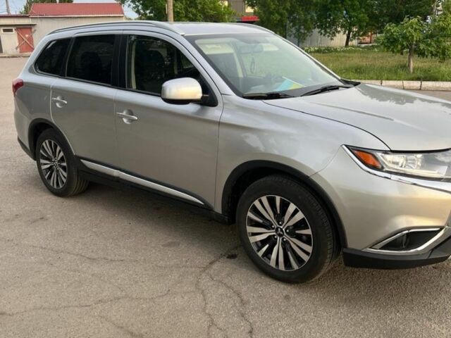 Сірий Міцубісі Аутлендер, об'ємом двигуна 2.36 л та пробігом 110 тис. км за 16000 $, фото 1 на Automoto.ua