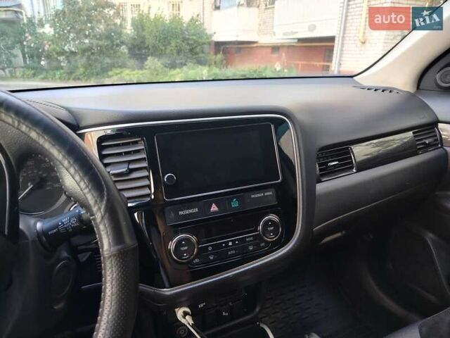 Сірий Міцубісі Аутлендер, об'ємом двигуна 2.4 л та пробігом 95 тис. км за 16800 $, фото 6 на Automoto.ua