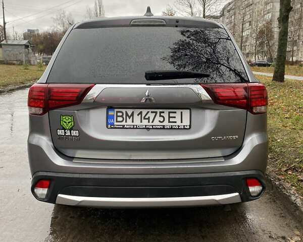 Серый Мицубиси Аутлендер, объемом двигателя 2.36 л и пробегом 150 тыс. км за 13500 $, фото 5 на Automoto.ua