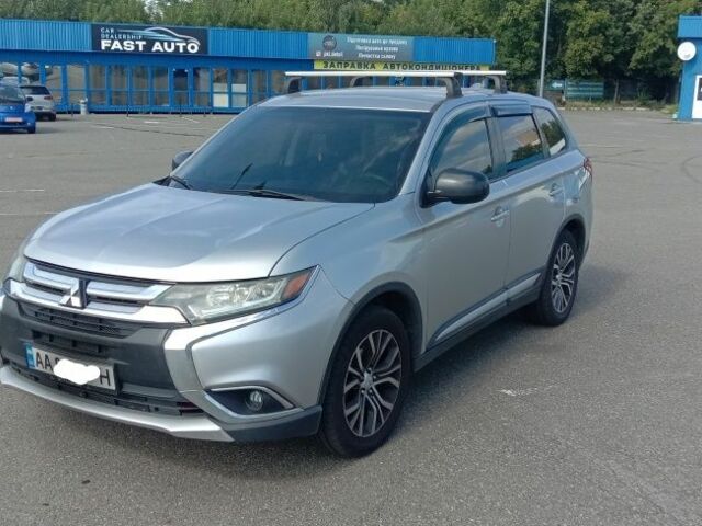 Серый Мицубиси Аутлендер, объемом двигателя 2.4 л и пробегом 100 тыс. км за 17700 $, фото 1 на Automoto.ua