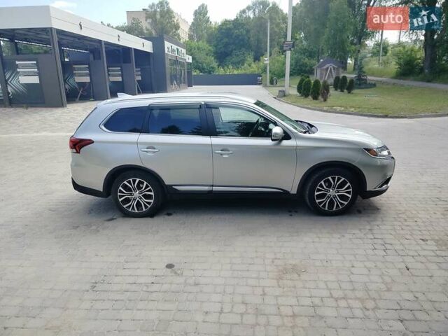 Сірий Міцубісі Аутлендер, об'ємом двигуна 2.4 л та пробігом 95 тис. км за 16800 $, фото 11 на Automoto.ua