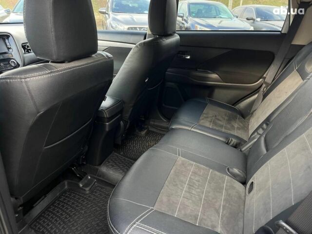 Серый Мицубиси Аутлендер, объемом двигателя 2.4 л и пробегом 183 тыс. км за 16590 $, фото 14 на Automoto.ua