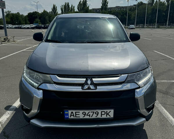 Серый Мицубиси Аутлендер, объемом двигателя 2.4 л и пробегом 185 тыс. км за 16346 $, фото 2 на Automoto.ua