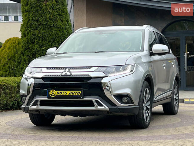 Сірий Міцубісі Аутлендер, об'ємом двигуна 3 л та пробігом 156 тис. км за 18500 $, фото 2 на Automoto.ua