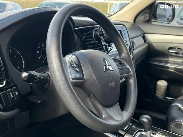 Серый Мицубиси Аутлендер, объемом двигателя 2.4 л и пробегом 183 тыс. км за 16590 $, фото 17 на Automoto.ua