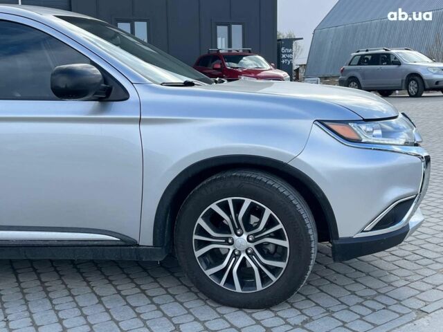 Серый Мицубиси Аутлендер, объемом двигателя 2.4 л и пробегом 183 тыс. км за 16590 $, фото 11 на Automoto.ua